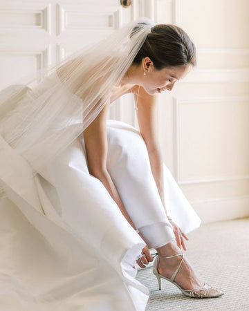 Caley wore Frances crystal shoes to add a hint of shine to her timeless bridal look. 