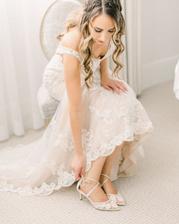 Bella Belle bride Danielle wore Amelia lace ivory low-heel wedding shoes.