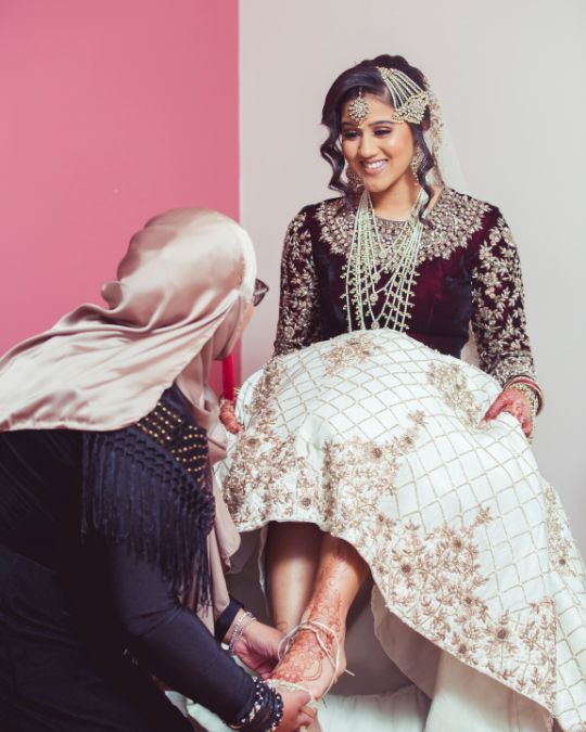 Bella Belle Anisha wore Frances gold wedding shoes with a beautiful traditional dress.