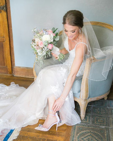 Bella Belle bride Mehgan wore Eve lavender wedding shoes with butterflies