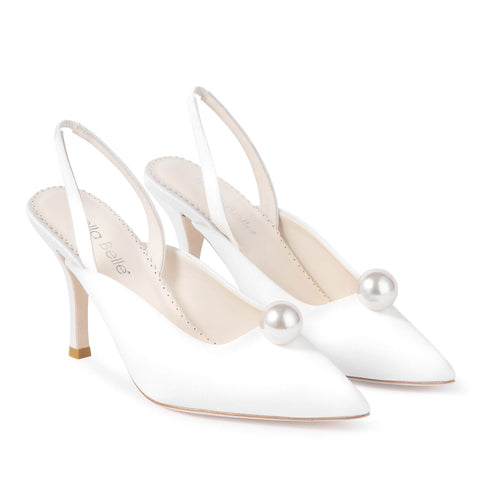 Pair of ivory pointed-toe slingback heels with twin pearl ornaments and stiletto heels