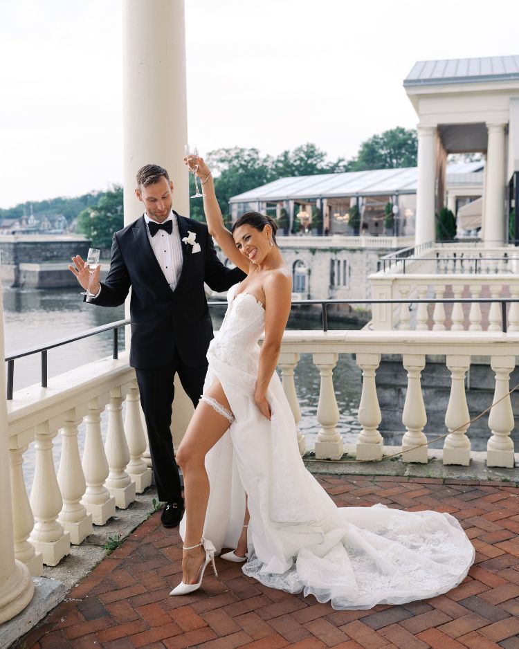 Bella Belle Brides Gabriela wears Mirabelle with her high slit wedding dress