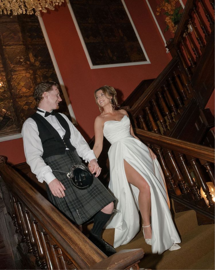 Bella Belle Brides Lucy wears ‘Alexia’ with her high slit wedding dress